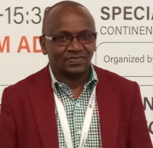Dr. Kamau Mwangi